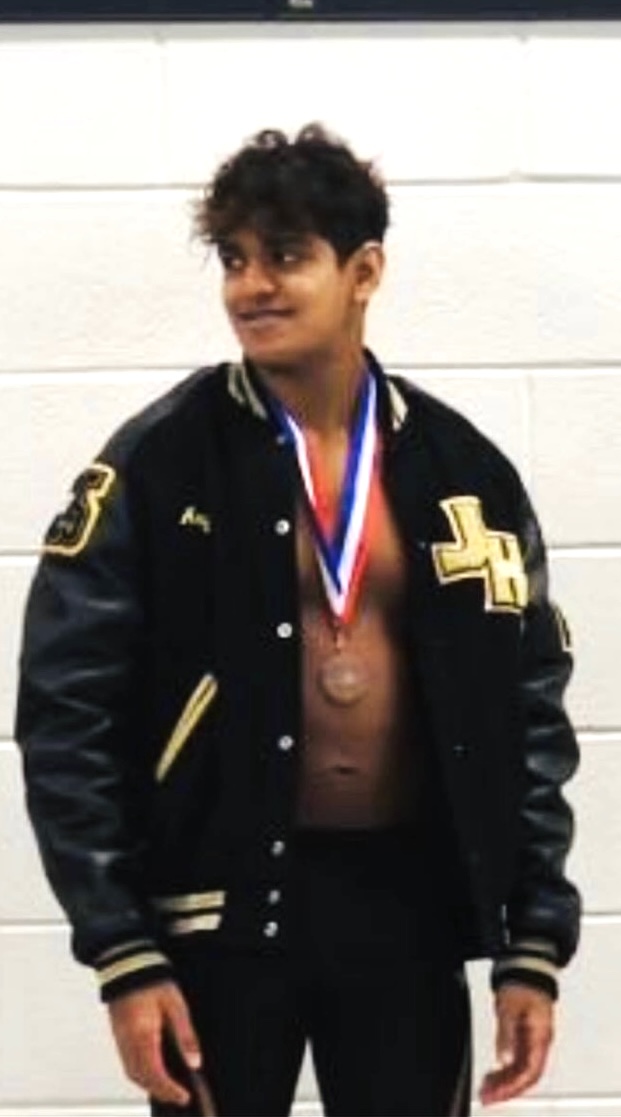 Photo of me with my regional finalist medal